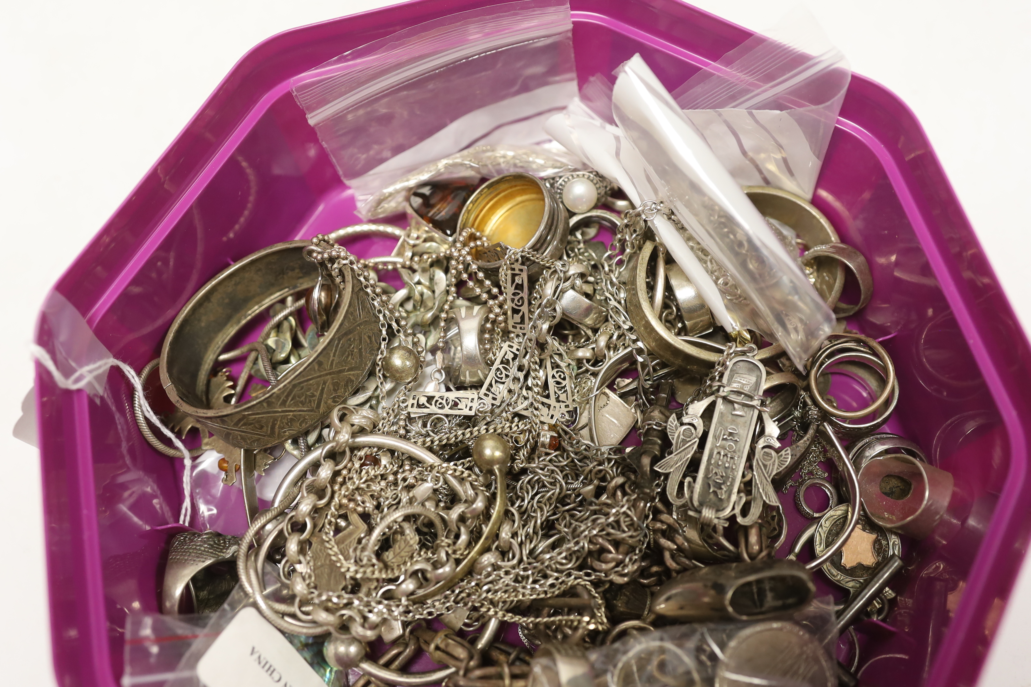 A large quantity of assorted silver, 925 and white metal jewellery including alberts, earrings, rings etc.